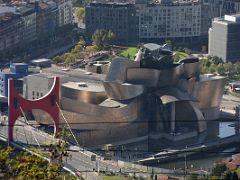 01C Guggenheim Bilbao Frank Gehry Building And Arcos rojos - Daniel Buren 2007 La Salve Bridge From Mount Artxanda Guggenheim Bilbao Spain