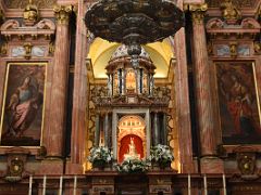 02C The Tabernacle on the main altar is flanked by paintings of Saint Acisclus and Saint Victoria by Antonio Palomino Mezquita Mosque Cathedral Cordoba Spain