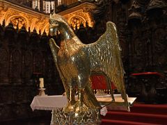 07 Brass eagle lectern with bottom of Episcopal throne and carved choir stalls behind Mezquita Mosque Cathedral Cordoba Spain