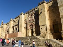 01B The west wall of the Mezquita Mosque Cathedral has ornate Arabic architecture Cordoba Spain