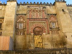 02A Ornate Door of Saint Ildephonsus on the outside west wall of the Mezquita Mosque Cathedral Cordoba Spain