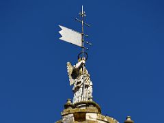 02B The bell tower is topped by a sculpture of Saint Raphael by Pedro de la Paz and Bernabe Gomez del Rio Mezquita Mosque Cathedral Cordoba Spain