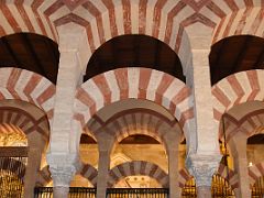 01C Columns and Moorish design with Christian Chapels behind in the Mezquita Mosque Cordoba Spain