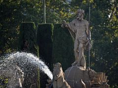 01C Sea-god Neptune holds a trident and a coiled snake at Neptune Fountain Madrid Spain