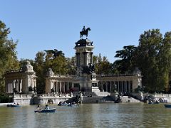 03A Estanque Grande pond is used for recreation and water sports With Monument to Alfonso XIII El Retiro Park Madrid Spain