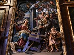 06B Holy Family Carving Of Mary Sewing, Joseph Woodworking With Young Jesus Looking Up In Basilica of Saint Mary of Coro In San Sebastian Donostia Old Town Spain