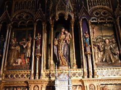 07B Statue Of Mary Holding Baby Jesus On Ornate Side Altar In Basilica of Saint Mary of Coro In San Sebastian Donostia Old Town Spain