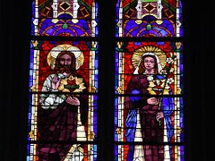 08 Stained Glass Image Of The Sacred Heart Of Jesus and Virgin Mary Holding A White Lily In Cathedral of the Good Shepherd San Sebastian Donostia Spain