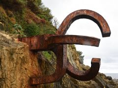 07B The Wind Comb 1977 sculpture by Eduardo Chillida is anchored to the rocks At The Bottom Of Mount Igueldo San Sebastian Donostia Spain