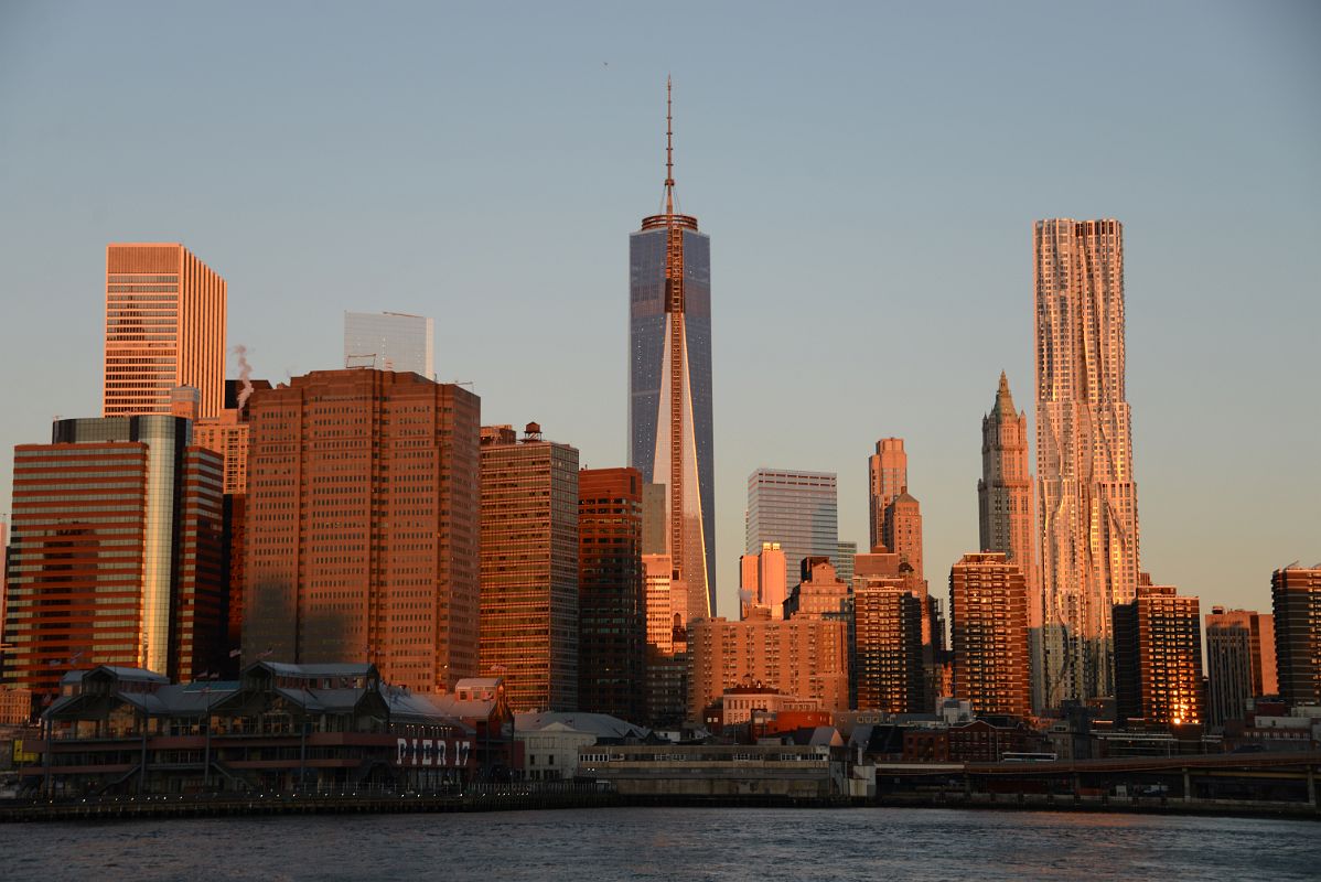 11 Sunrise On One Chase Manhattan Plaza, One World Trade Center, Woolworth  Building, New York by Gehry From Brooklyn Heights