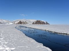 03A A Large Crack In The Ice Stops Our Progress With Bylot Island On Day 1 Of Floe Edge Adventure Nunavut Canada