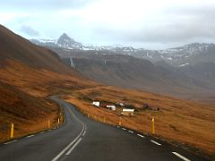 04B Maelifell mountain with Bjarnarfoss waterfall from Road 574 as it snakes around Axlarhyrna mountain on Snaefellsnes Peninsula Iceland