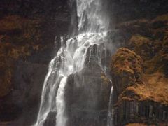 06C Bjarnarfoss waterfall water falls over lower tier basalt cliff next to road 54 on the south coast of Snaefellsnes Peninsula Iceland