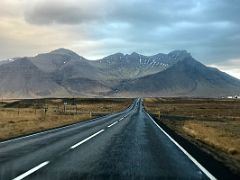 08C Driving on road 54 to the east with Hafursfell mountain ahead on the south coast of Snaefellsnes Peninsula Iceland