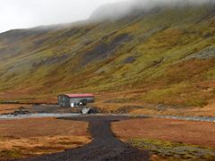 03B A lone building on the banks of the Straumfjardara River next to Road 56 on Snaefellsnes Peninsula drive to Stykkisholmur Iceland