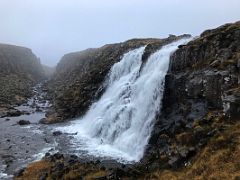 05C A waterfall tumbles into the Straumfjardara River next to Road 56 on Snaefellsnes Peninsula drive to Stykkisholmur Iceland