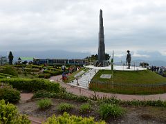 10A The Darjeeling Himalayan Railway Toy Train At Batasia Loop With The War Memorial In Darjeeling Near Sikkim India