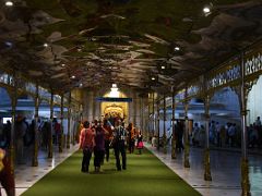 03A A Covered Walkway And Green Carpet Leads To The Darbar Hall At Gurdwara Bangla Sahib At Night Delhi India