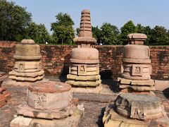 07A Stupas With Buddha Carvings In Courtyard At Sarnath Archeological Excavation Site India