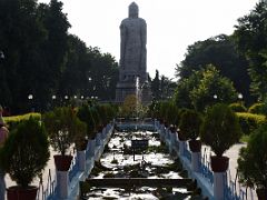 01A A Giant Buddha Statue Is Set In Beautiful Grounds At The Thai Temple At Sarnath India