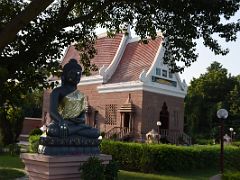 03B A Buddha Statue Stands Outside The Thai Temple At Sarnath India