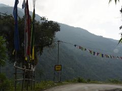 05A Turning A Steep Corner Surrounded By Prayer Flags On Drive To Mangan And Lachen Sikkim India