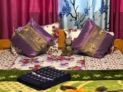 10B Dangles Enjoys The Colourful Comfortable Bed In Hotel Lachung Mandala In Lachung North Sikkim India