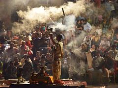 05C A Brahmin Rings A Bell And Waves Lamp Smoke Throughout The Crowd In The Ganga Aarti Fire Ceremony On The Banks Of The Ganges Varanasi India