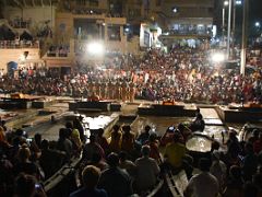 03C People Watch The Ganga Aarti Fire Ceremony From The Ghat And From Boats On The Banks Of The Ganges Varanasi India