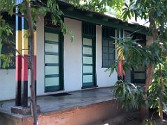 01B Outside the entrance building - Peter Tosh, Bunny Wailer and Bob Marley formed the Wailers and wrote the Catch a Fire LP in Culture Yard Trench Town Kingston Jamaica