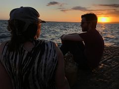 06C Sitting quietly on the waterfront enjoying the sunset over Kingston Harbour Kingston Jamaica