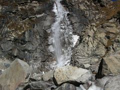 Kangchenjunga 03 05 Fairy Waterfall After Kambachen Just over an hour from Kambachen on the way to Lhonak is Khan-dum-chu, the fairy waterfall, whose waters are supposed to be sacred.