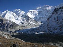 Kangchenjunga 04 03 Twins and Kangchenjunga North Face From Pangpema From Pangpema we had an excellent view of The Twins and Kangchenjunga in the mid-afternoon sun. Named by Freshfield, The Twins is a double peak (7005m and…