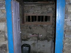 Kangchenjunga 09 04 Yamphudin House Toilet So, how do they do their, you know ...? Here is the toilet at Yamphudin. It's a porcelain set of feet with a chute. Although it is initially hard on our Western…