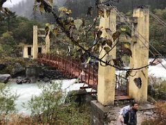 02A The Trail Quickly Crosses A Bridge Over The Lhonak Chu River After Leaving Tallem On Day 2 Of The Kangchenjunga East Face Green Lake Trek To Jakthang