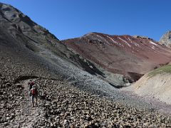 07A Crossing the scree slope with the zig zag trail up to Travellers Pass 4133m ahead on the way to Ak-Sai Travel Lenin Peak Camp 1 4400m