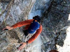 06B Climbing a steep section of rocks with a hand rope for safety on the way to Lobuche East Base Camp