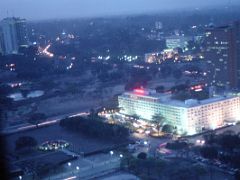 13B Northwest View After Sunset NSSF Building On Left, White InterContinental Hotel, Brown Nyayo House From Kenyatta Centre Observation Deck In Nairobi Kenya In October 2000