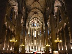 02A Looking up the central nave with stone pillars toward the main altar in Basilica of Santa Maria del Mar Barcelona Spain