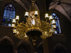 07 Metalwork chandelier hangs from the ceiling in Basilica Santa Maria del Mar Barcelona Spain