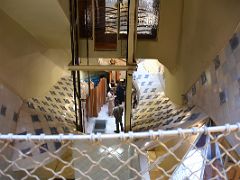 07C Looking Down At The Bottom Of The Central Lightwell With decorative blue tiles Casa Batllo Gaudi Barcelona Spain