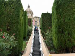 03B The escalator is flanked by large green hedges to the upper area of Museu Nacional d Art de Catalunya Palau Nacional building Barcelona Spain