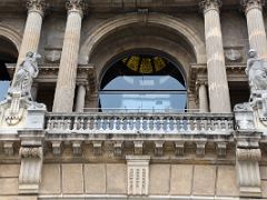 04A Statues and stone columns on the central part of the facade of the Palau Nacional which houses the Museu Nacional d Art de Catalunya Barcelona Spain