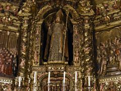 06B Altarpiece of Saint Sever with him preaching on left and ordination on right in side chapel 1683 Barcelona Cathedral Spain