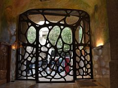 03A Decorative black wrought-iron gate from inside La Pedrera Casa Mila Gaudi Barcelona Spain