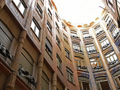 03B Looking up at the wrought-iron railings on the building from the Butterfly Courtyard La Pedrera Casa Mila Gaudi Barcelona Spain