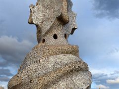 07A Stairwell chimney covered with trencadis, fragments of stone, marble or ceramic Roof La Pedrera Casa Mila Gaudi Barcelona Spain