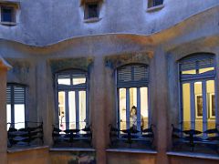 12C The building in the evening with wrought-iron railings La Pedrera Casa Mila Gaudi Barcelona Spain