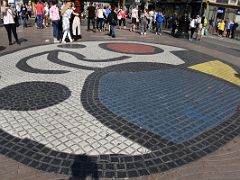 08 Mosaic del Pla de l Os is a large and colourful circular mosaic by famed artist Joan Miro, inlaid in the ground along La Rambla Barcelona Spain