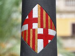 12B The Gaudi street light in Placa Reial Royal Plaza has the Barcelona coat of arms in the centre of the column near La Rambla Barcelona Spain